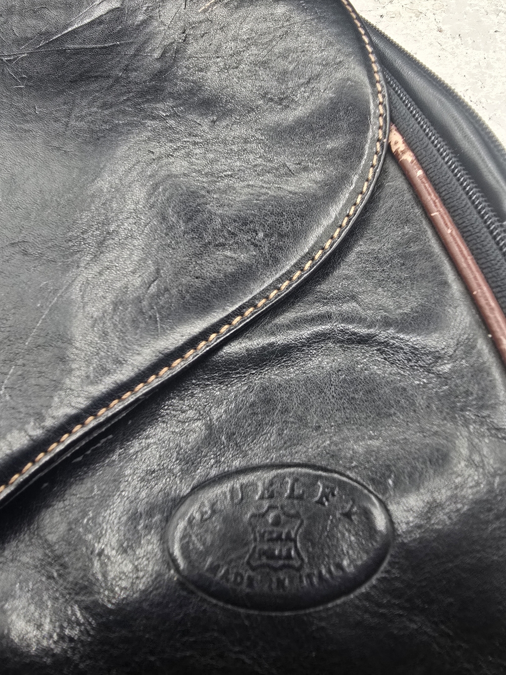 Black Leather Men’s Messenger Bag with Embossed Logo